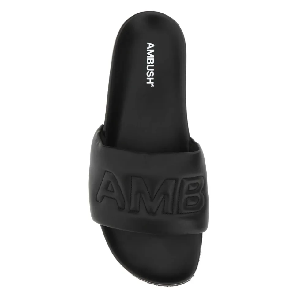 Black leather slippers