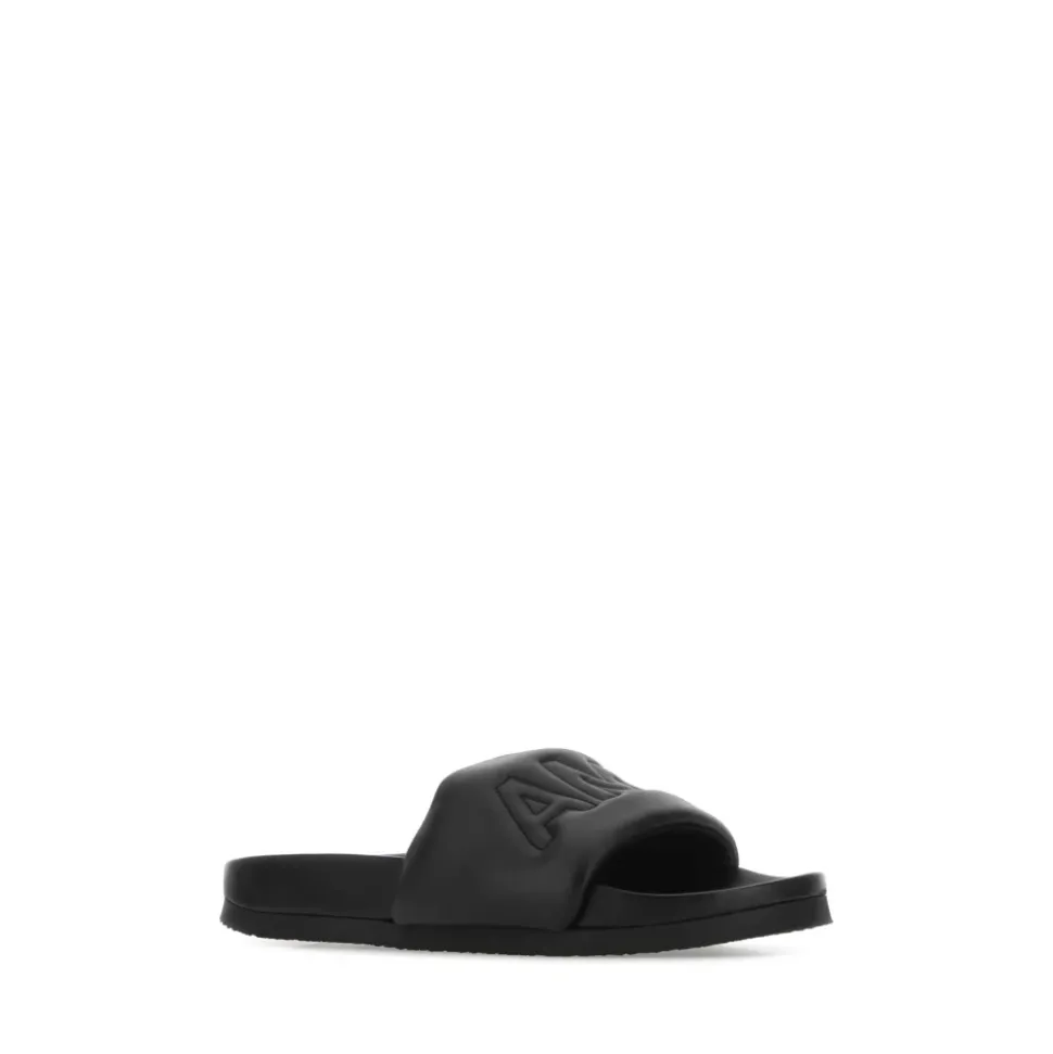 Black leather slippers